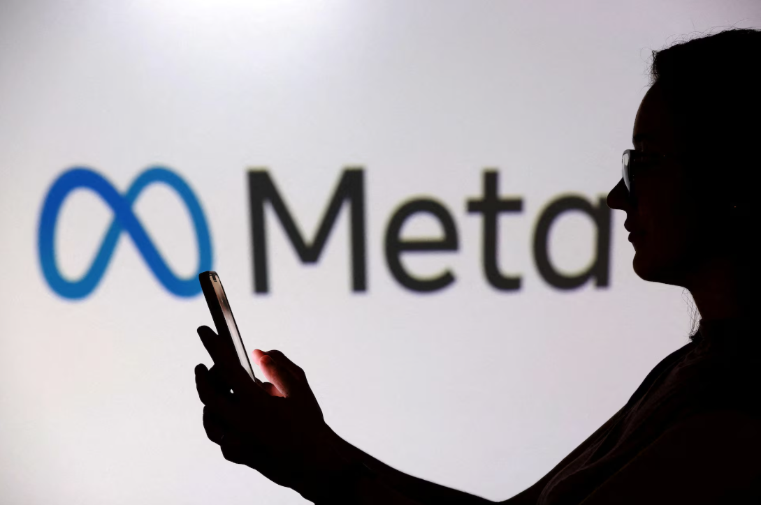 Meta logo person with phone