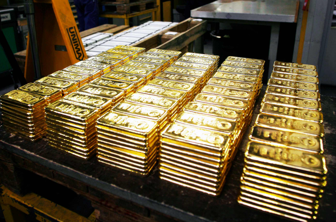 gold bars in storage stacks