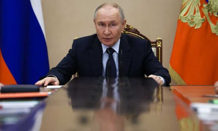 Putin chairing a government meeting in Moscow as oil revenues surge amid the Iran war