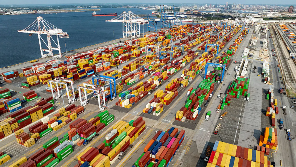 Aerial view of US port loaded with shipping containers