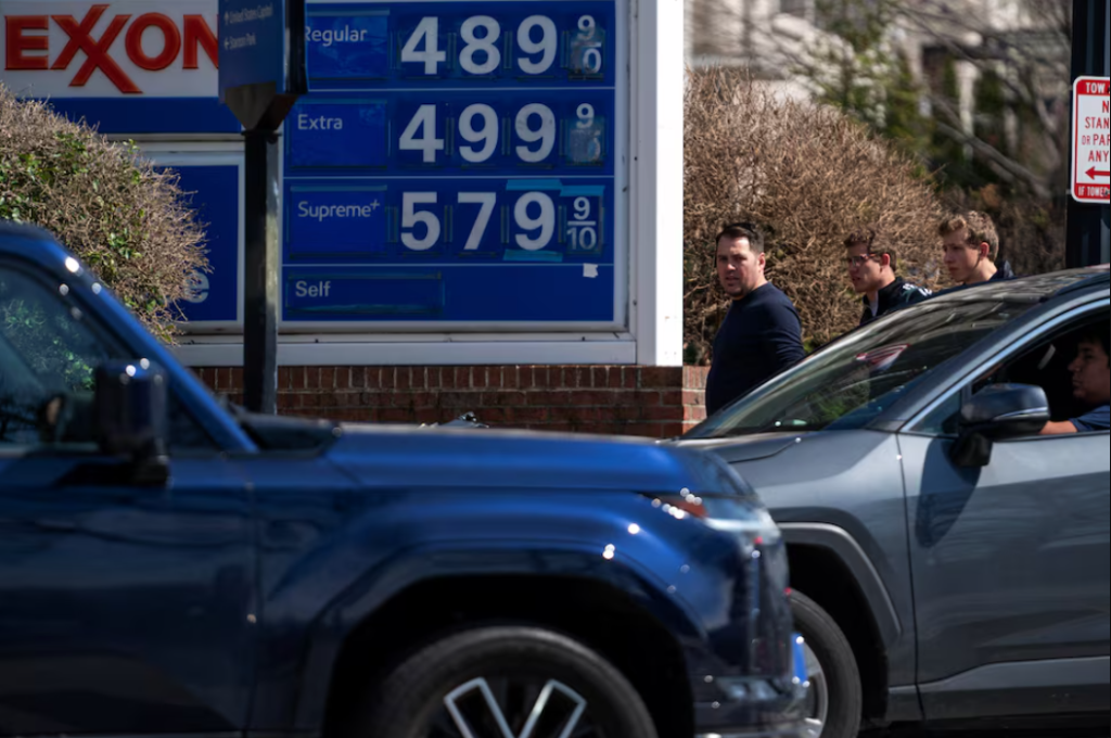 Exxon station price board at $4.89 regular