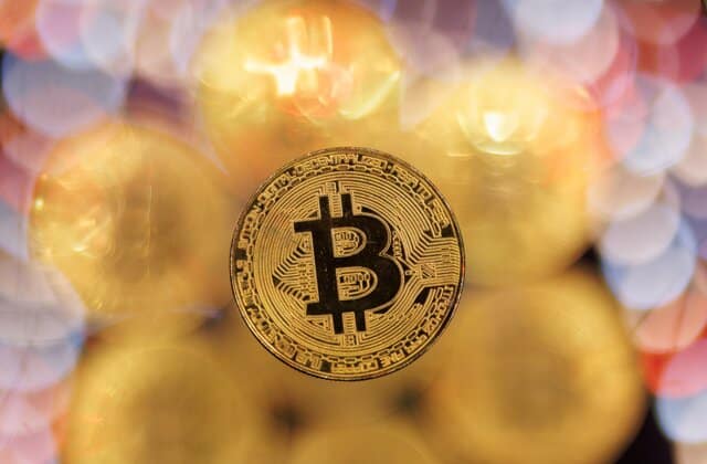 Bitcoin logo coin with btc price rebound