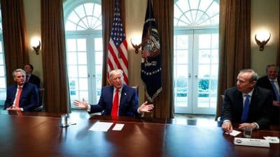 President Trump speaks alongside Chevron CEO Mike Wirth at a White House roundtable — Wirth had warned days earlier that physical oil supply shortages would begin appearing due to the Strait of Hormuz closure