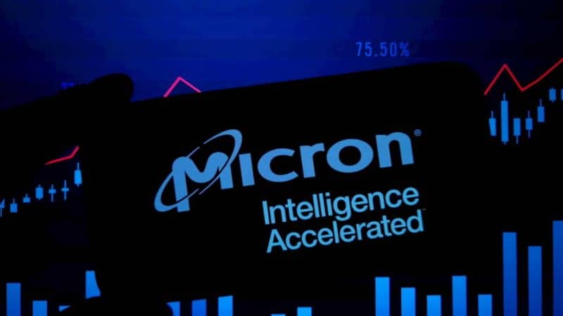 Micron stock on phone with chart background