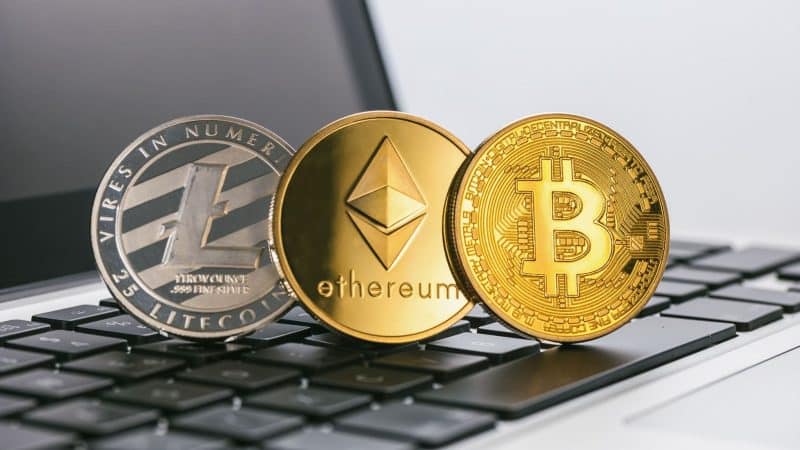 Bitcoin, Litecoin and Ethereum standing in a computer Bitcoin holds 80k Litecoin steady climb
