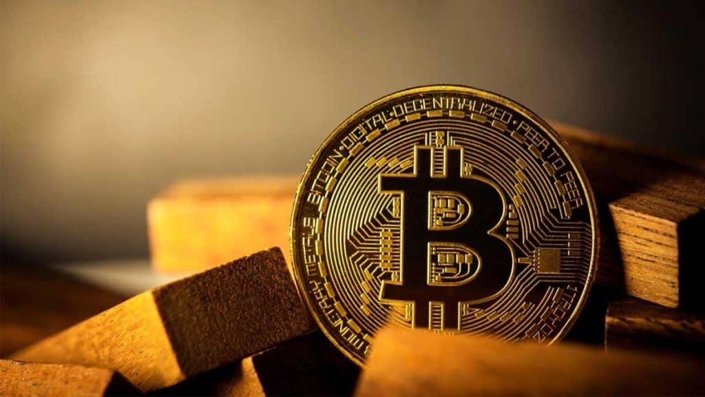 Bitcoin coin around gold BTC