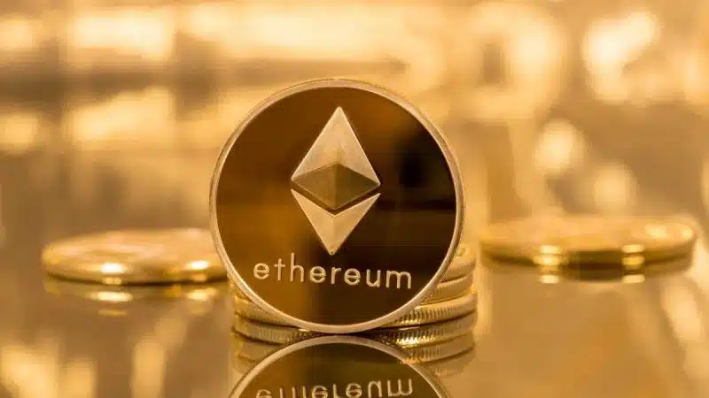 ETH coin with golden background
