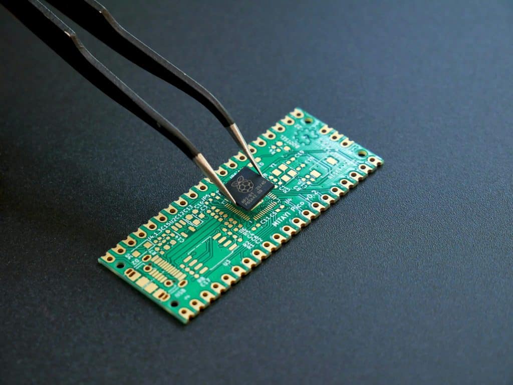 AI chip on semiconductor board representing Semiconductor Stocks AI stock selloff Defensive stocks rally AI bubble AI infrastructure concerns