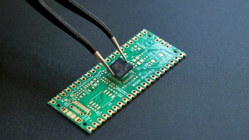 AI chip on semiconductor board representing Semiconductor Stocks AI stock selloff Defensive stocks rally AI bubble AI infrastructure concerns