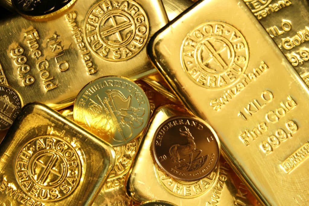 Gold price prediction with stacked gold bars reflectingsafe-haven demand