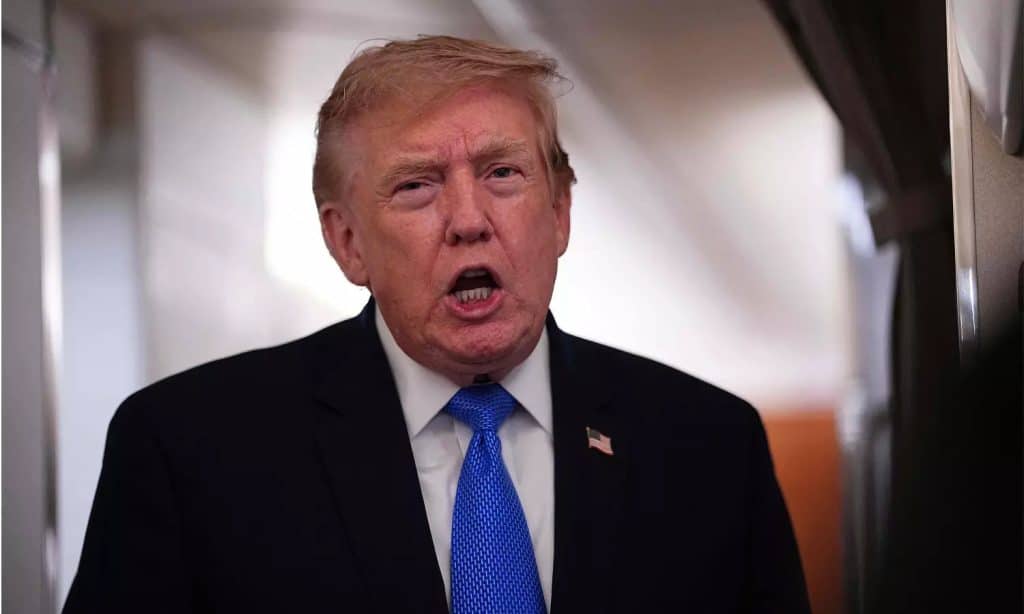 Image of Donald Trump as Warren and Blumenthal urge an SEC investigation into the Trump memecoin amid the Truth API and Truth Social controversy.
