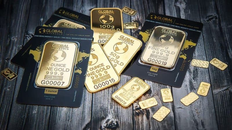 Gold price floor support Central bank reserves US budget deficit Real interest rates UBS gold forecast